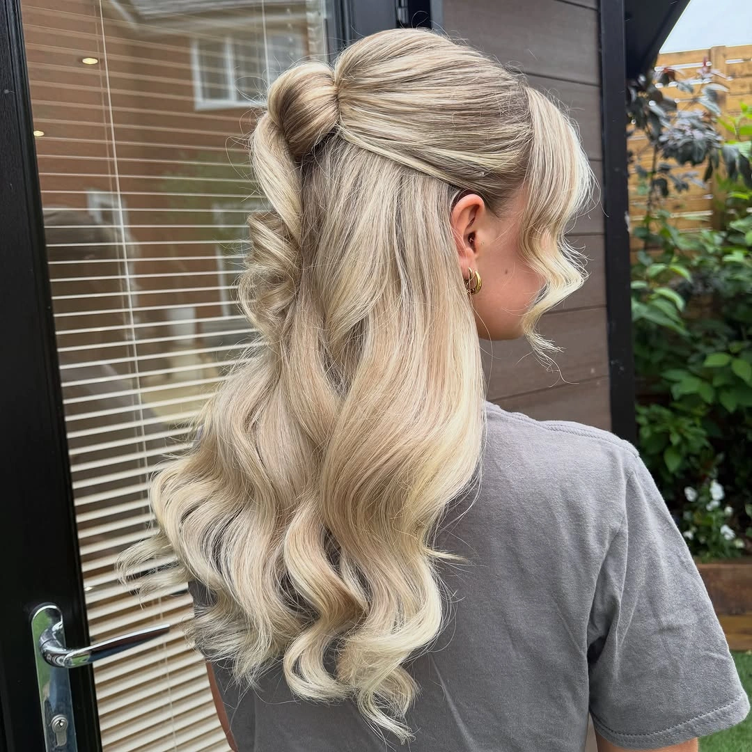 Fall hairstyles for wedding guests 2026 Romantic Half-Up Blonde Waves with Soft Volume