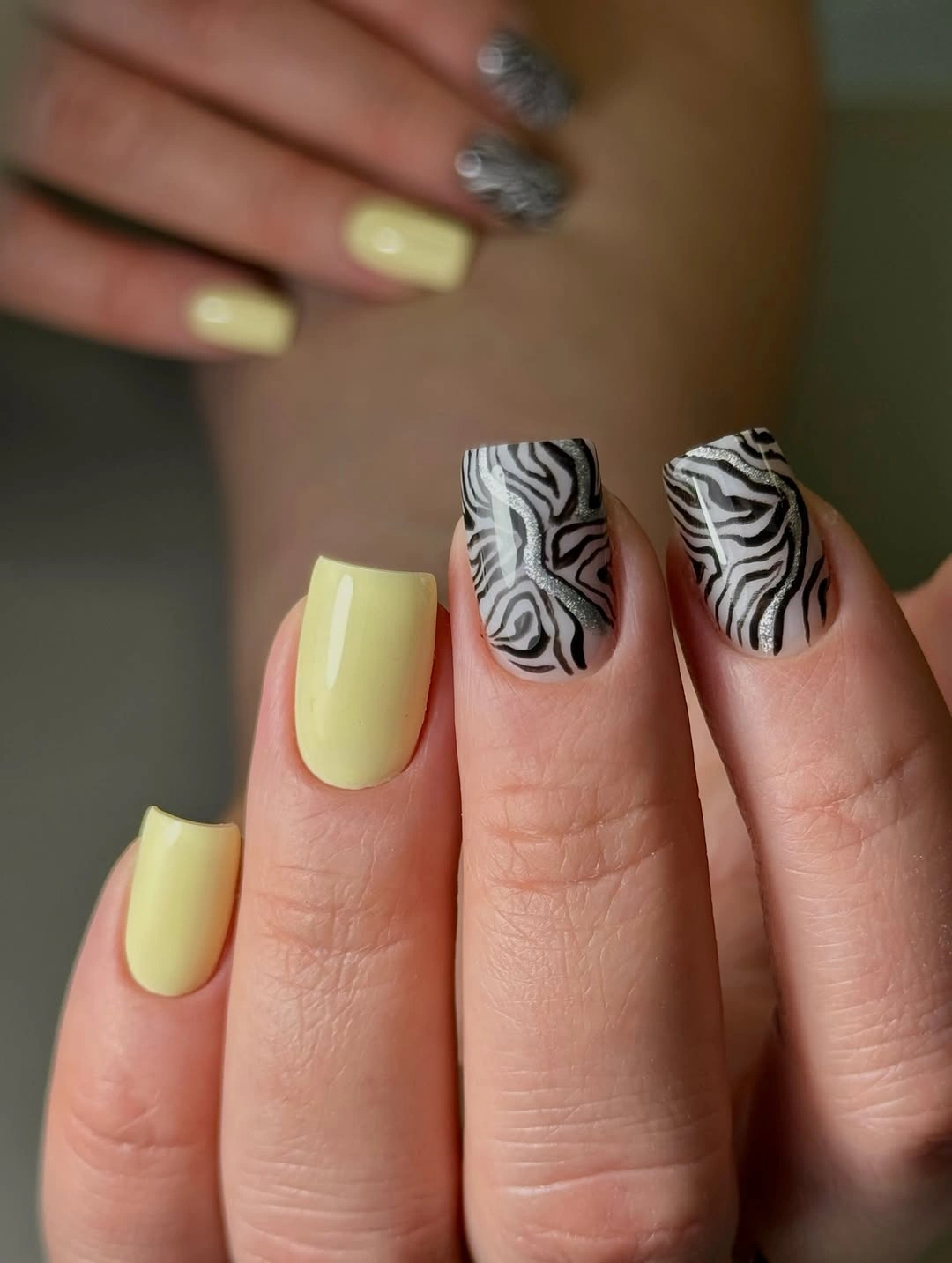 Fall manicure 2026 Pale Yellow Nails With Zebra Accent Art