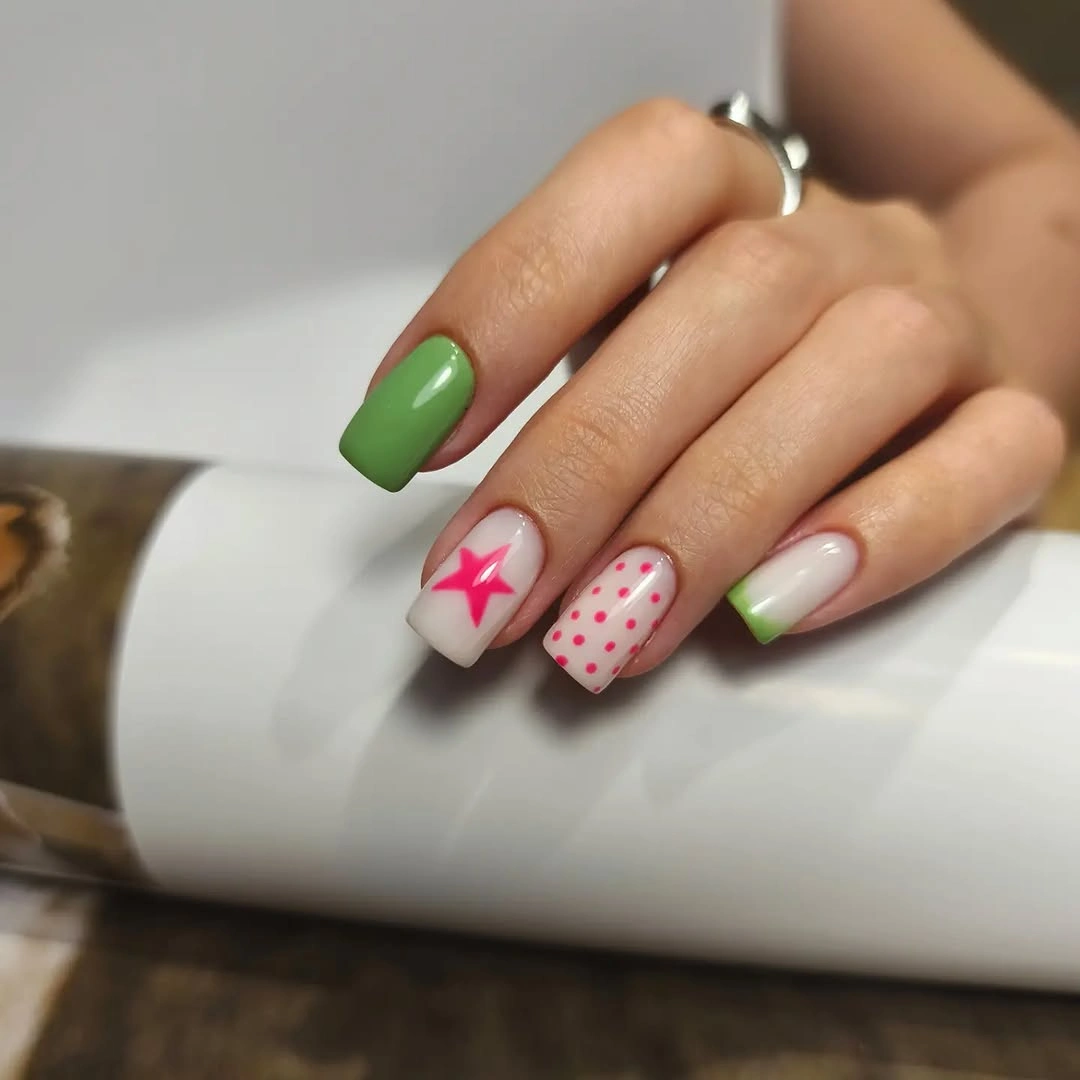 Fall manicure 2026 Green Nails With Pink Star and Dot Accents