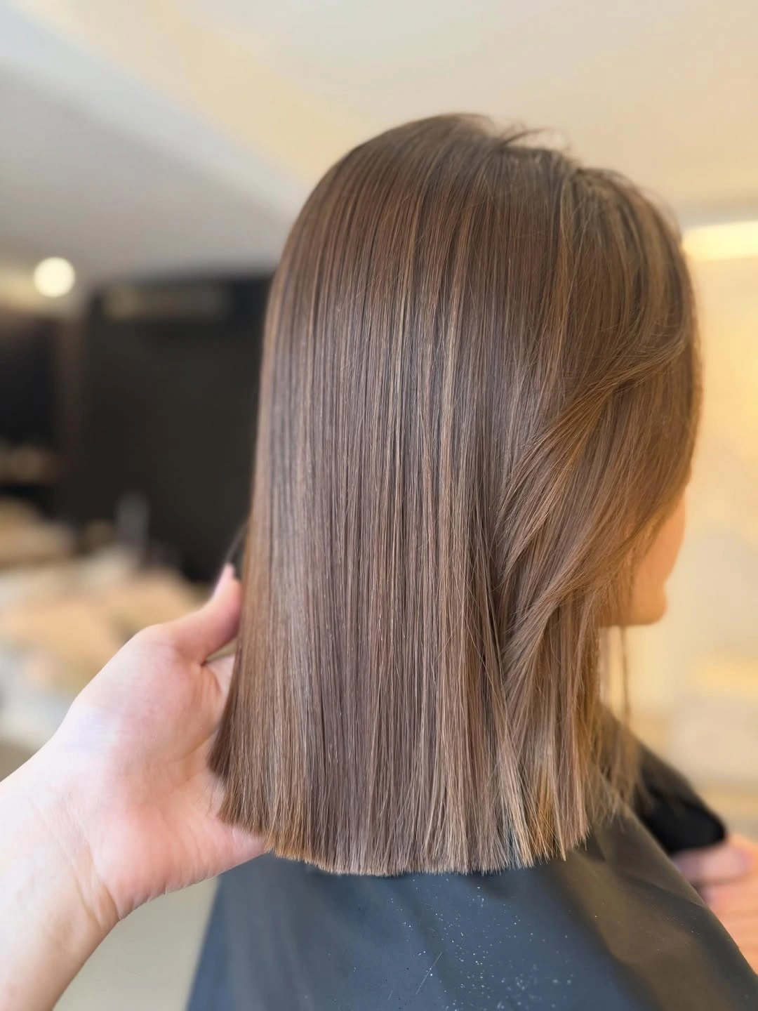 fall medium haircuts 2026 Glass Hair Bob With Mirror-Like Shine
