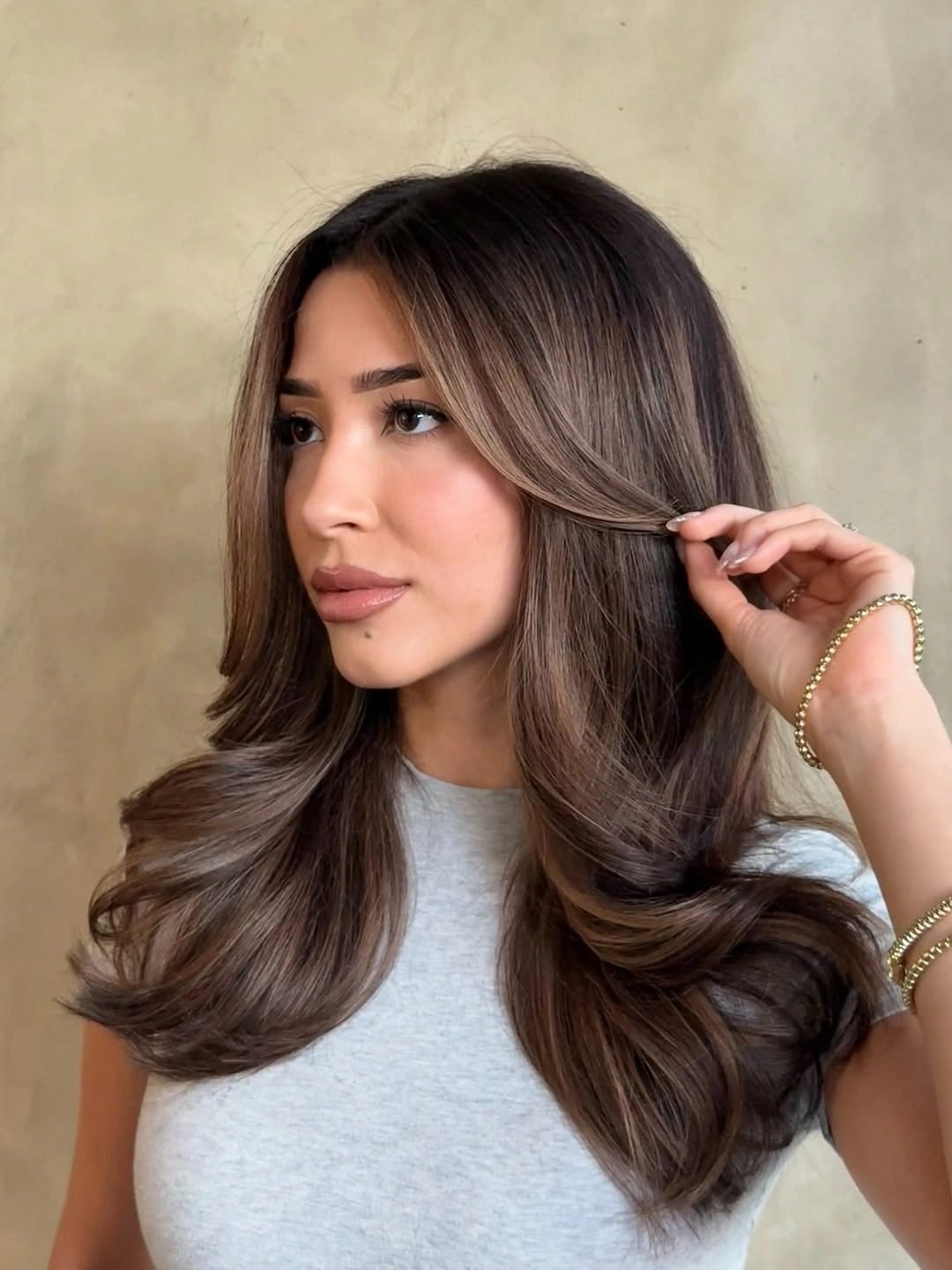 fall medium haircuts 2026 Classic Blowout Layers With Luxurious Volume