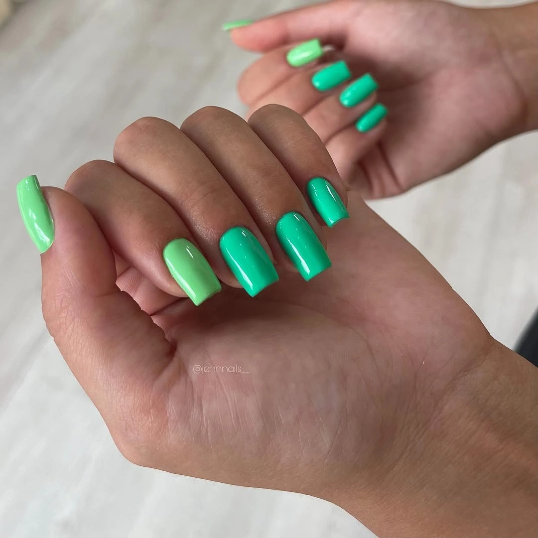 lime and vivid green medium square nails with alternating solid greens