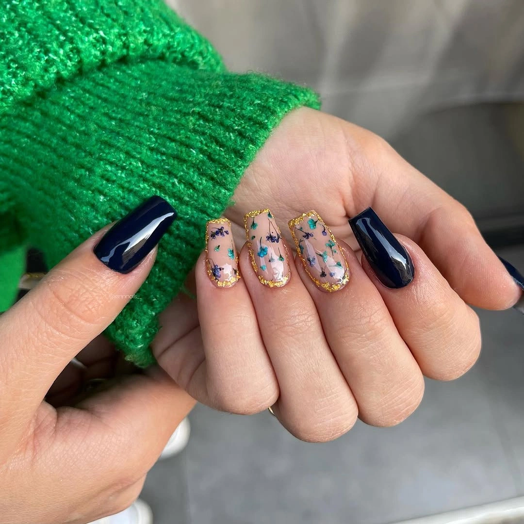 deep navy medium square nails with floral accents with gold edging