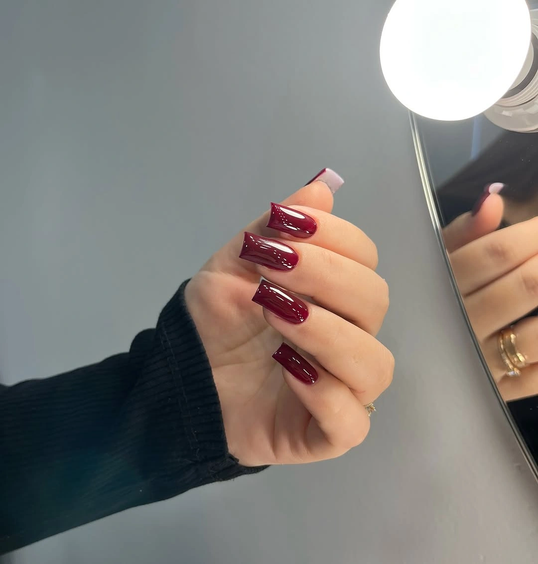 dark burgundy long square nails with solid glossy color