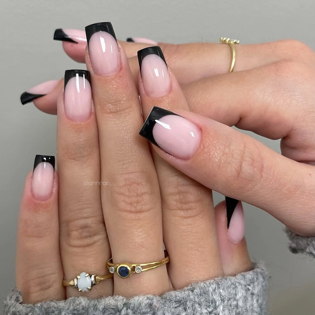 sheer pink and black medium square nails with wide black French tips