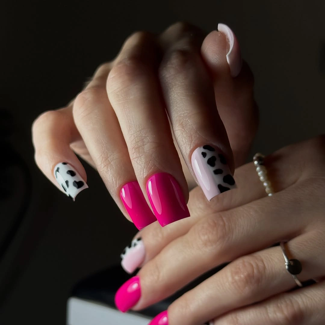 Fall nail art 2026 Hot Pink Nails With Black-and-White Spot Accents
