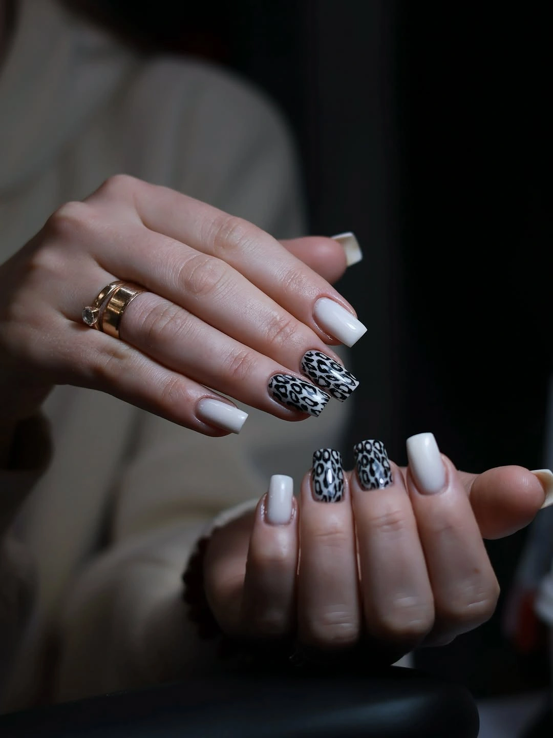 Fall nail art 2026 Pale Gray Nails With Black Floral Accent Art