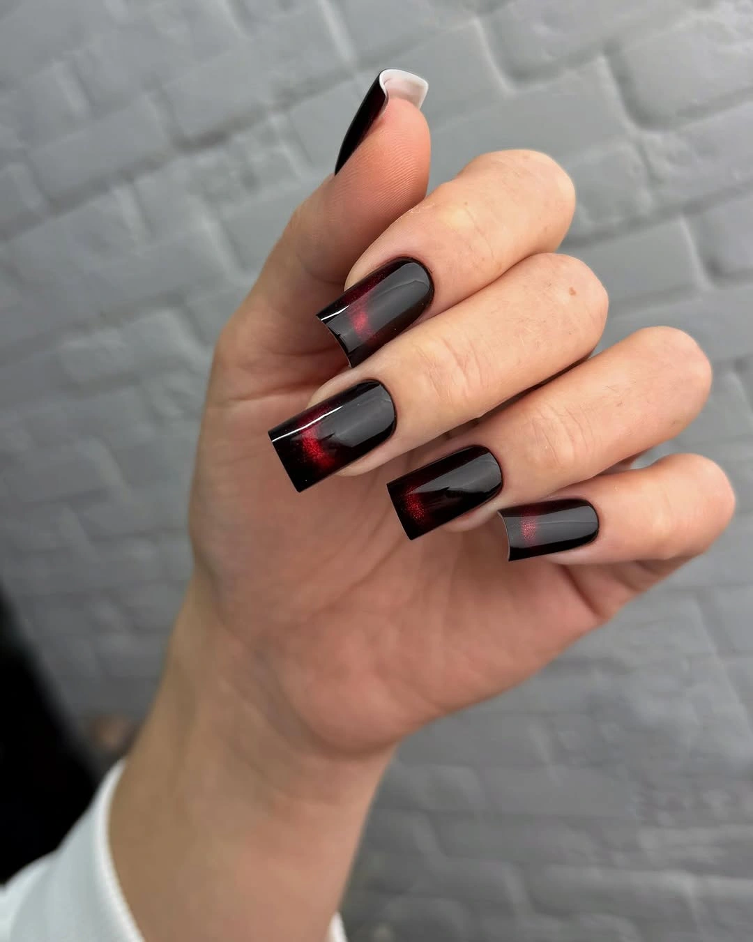 Fall nail art 2026 Black and Red Block Nails With Smoky Centers