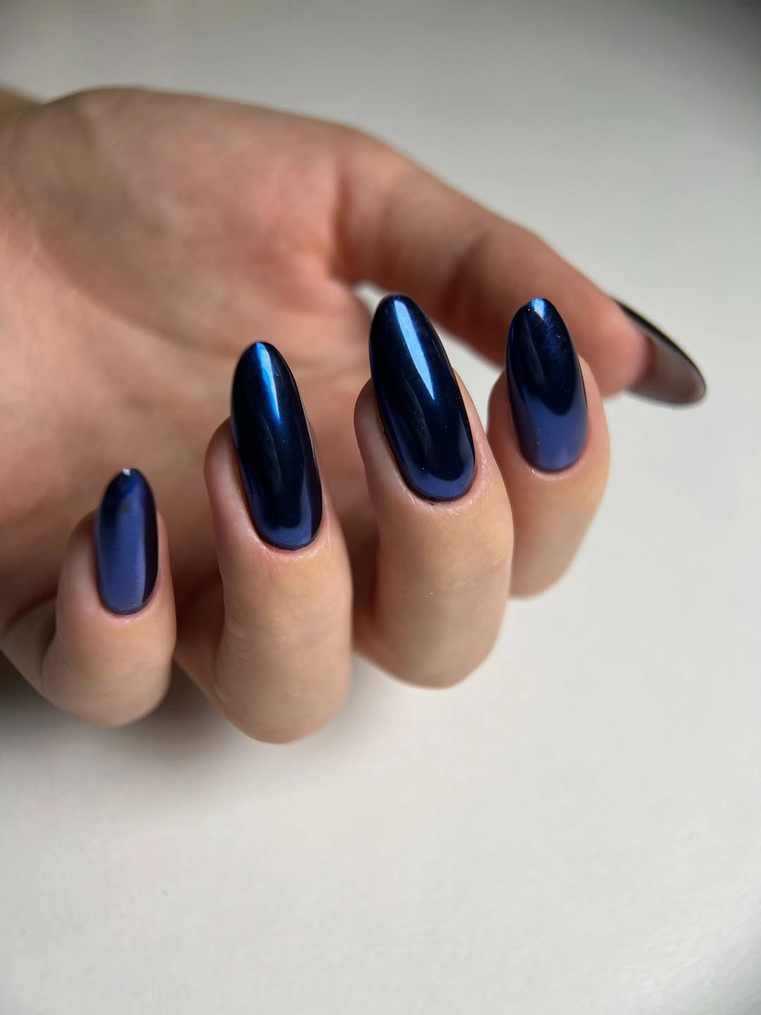 Fall nail art 2026 Metallic Cobalt Oval Nails With Blue Depth