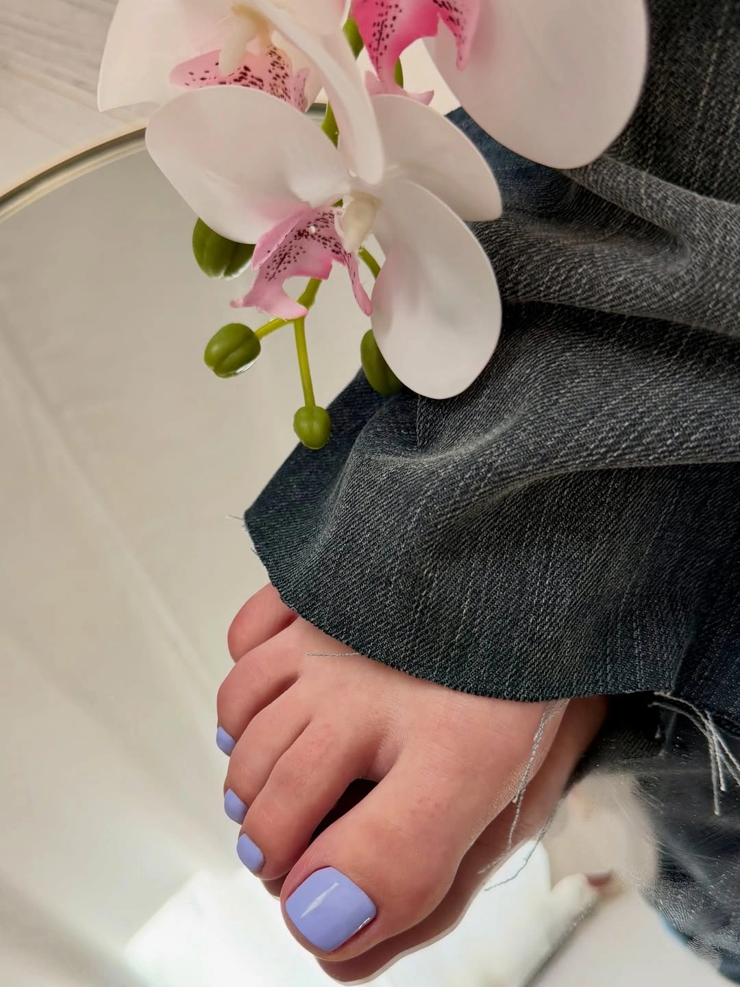 cool periwinkle pedicure with dark denim styling