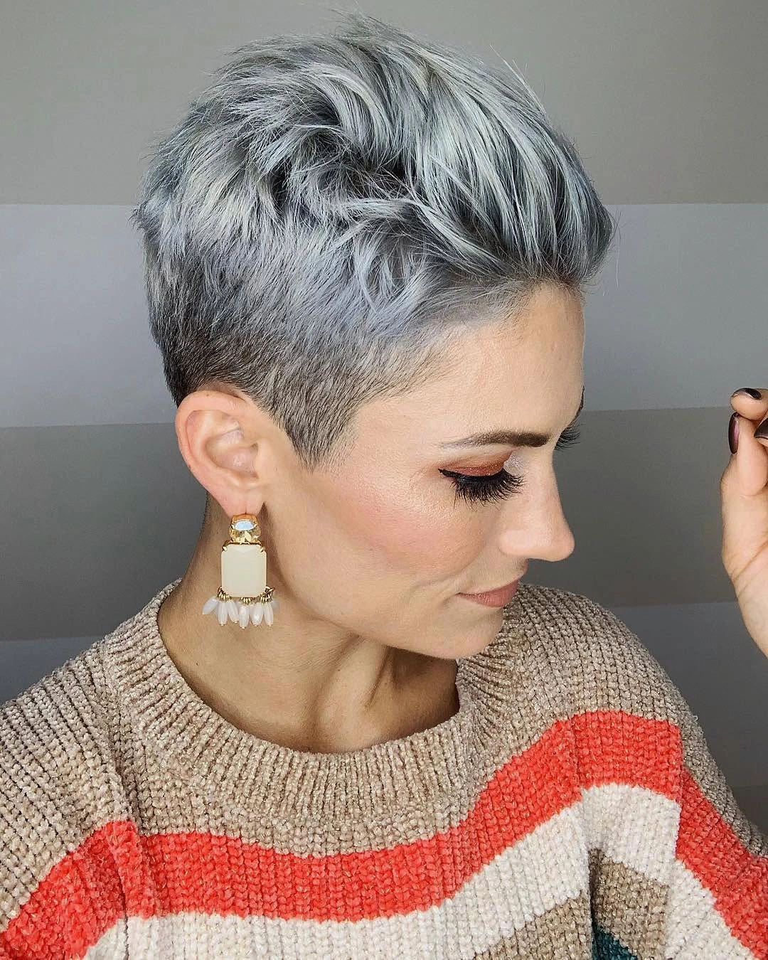 fall pixie haircut ideas 2026 Textured Frosted Pixie with Modern Silver Dimension