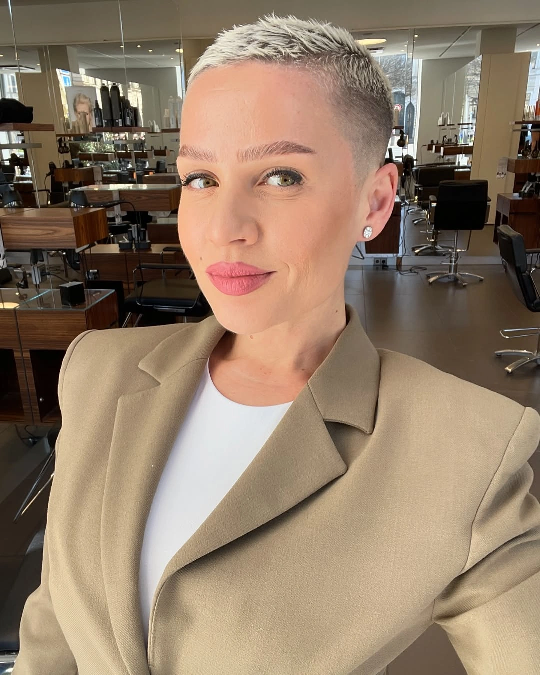 fall pixie haircut ideas 2026 Ultra Short Platinum Buzz Pixie