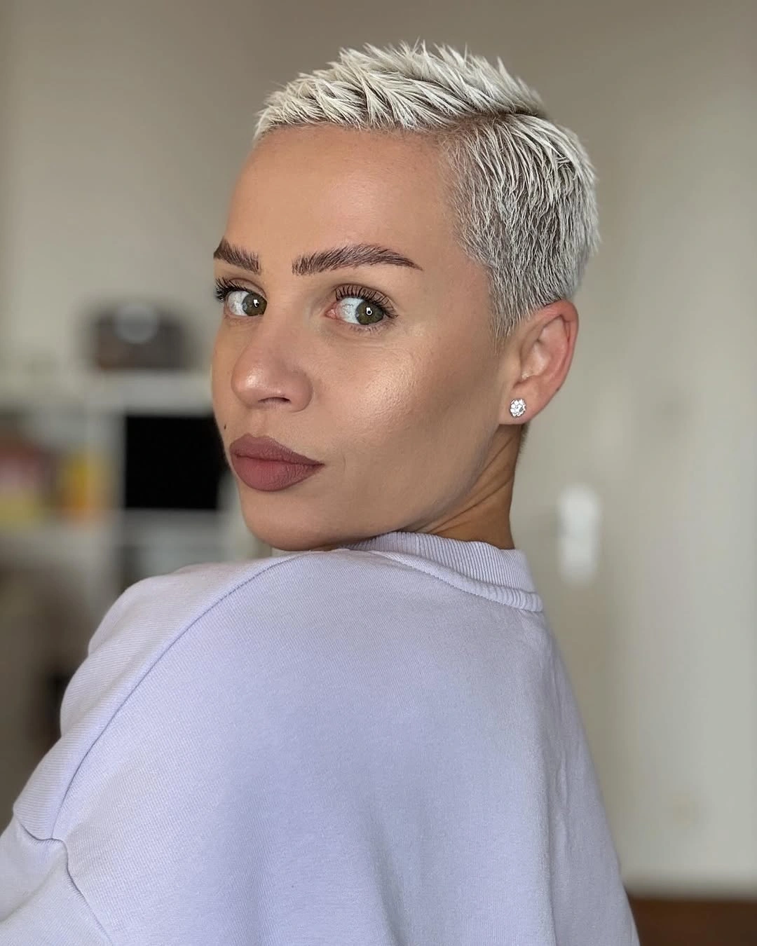 fall pixie haircut ideas 2026 Textured Frost Blonde Pixie Crop