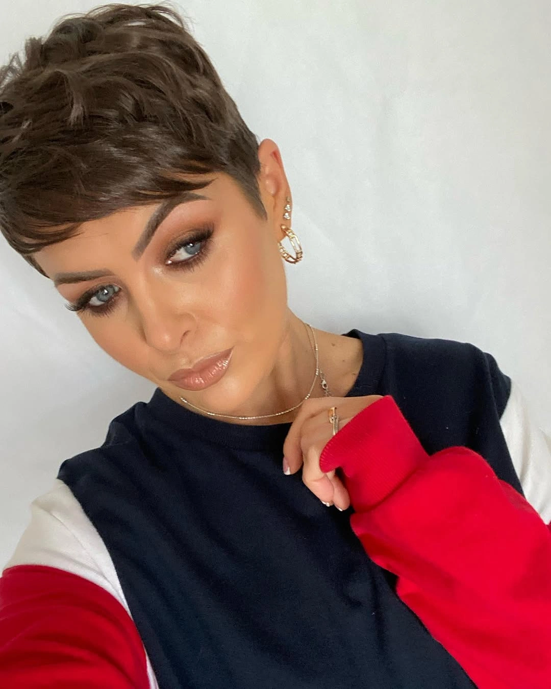 fall pixie haircut ideas 2026 Voluminous Chocolate Pixie with Feathered Crown