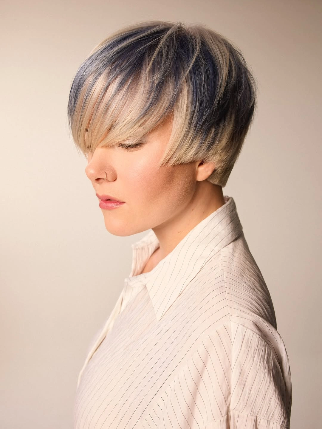 fall pixie haircut ideas 2026 Bold Blonde Pixie with Dimensional Shadow Roots
