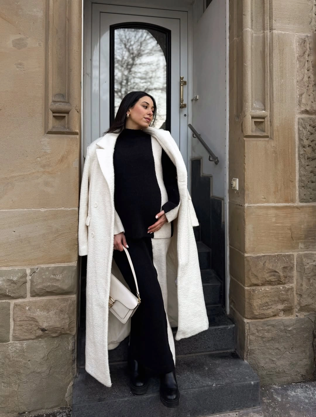 fall pregnancy outfits 2026 Black and Cream Knit Layers for Timeless Elegance