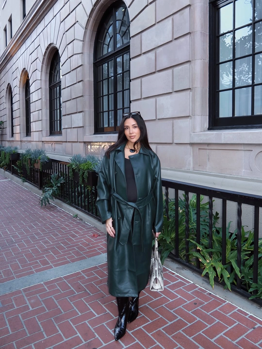 fall pregnancy outfits 2026 Forest Green Leather Coat with Minimalist Maternity Styling