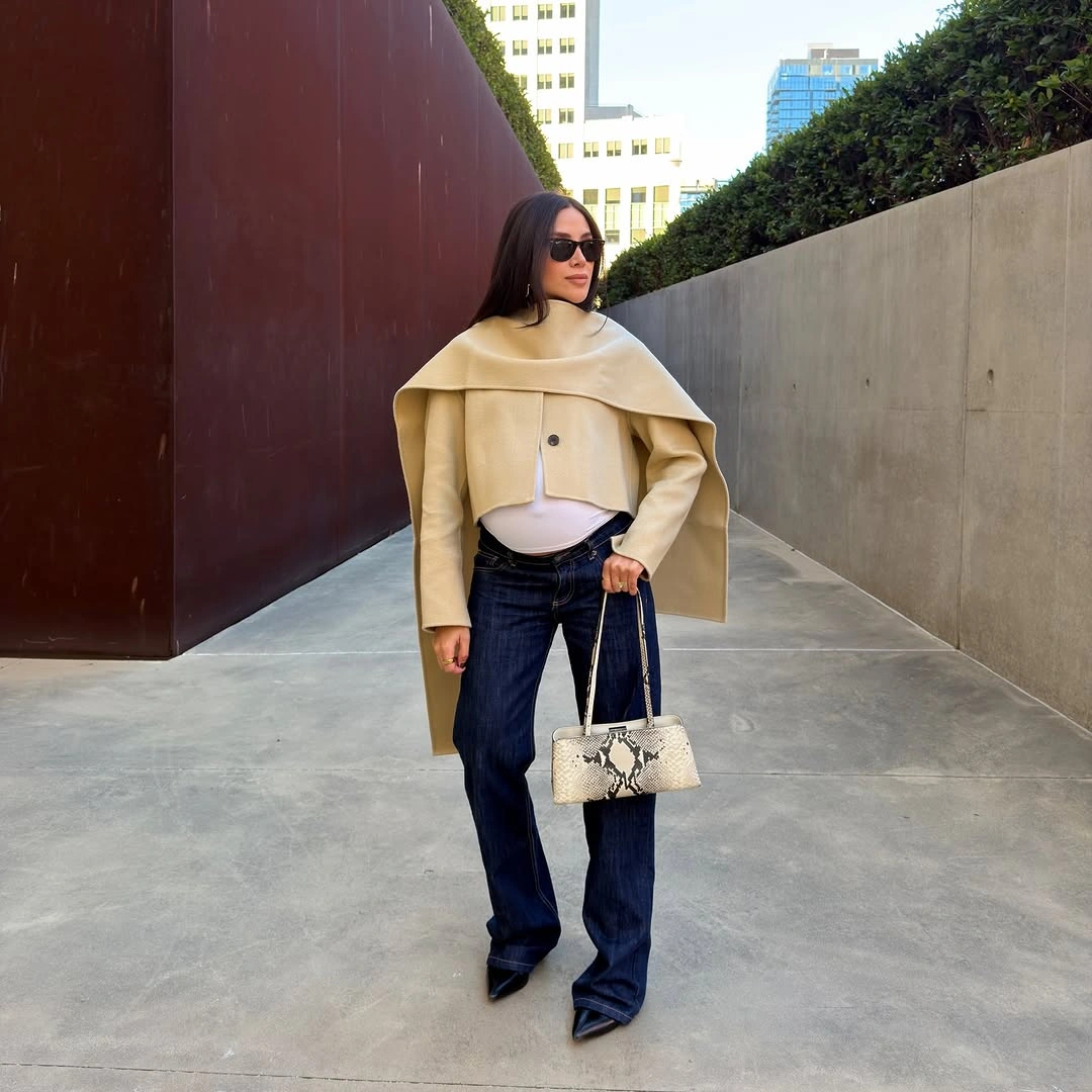 fall pregnancy outfits 2026 Modern Cape Jacket and Dark Denim for Fashion-Forward Days