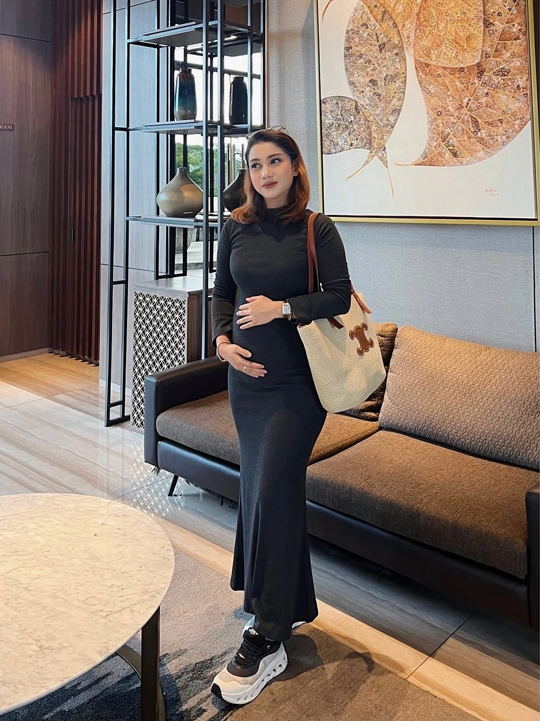 fall pregnancy outfits 2026 Minimal Black Knit Dress with Sporty Sneakers