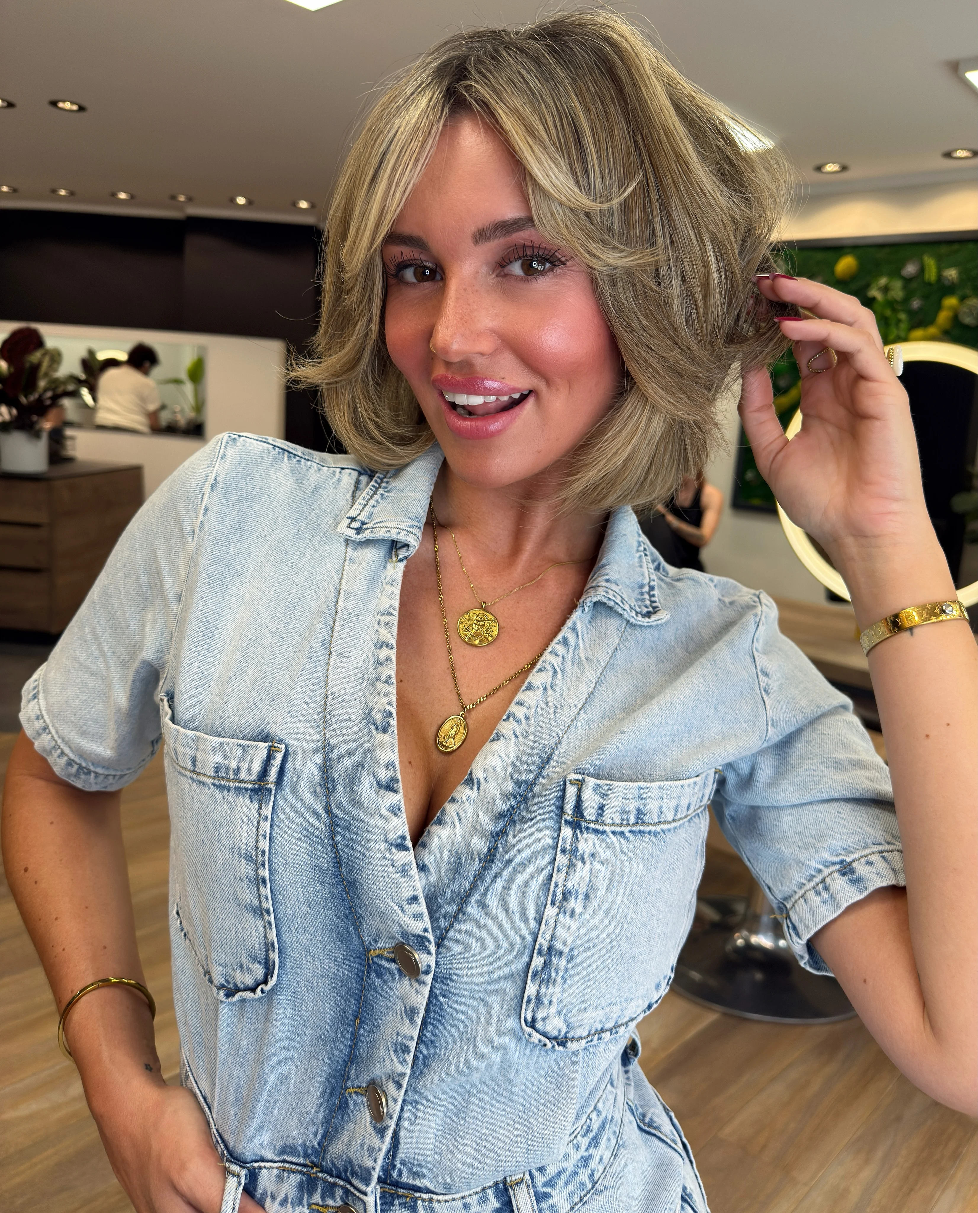 fall short haircuts 2026 Soft Layered Blonde Bob with Curtain Bangs