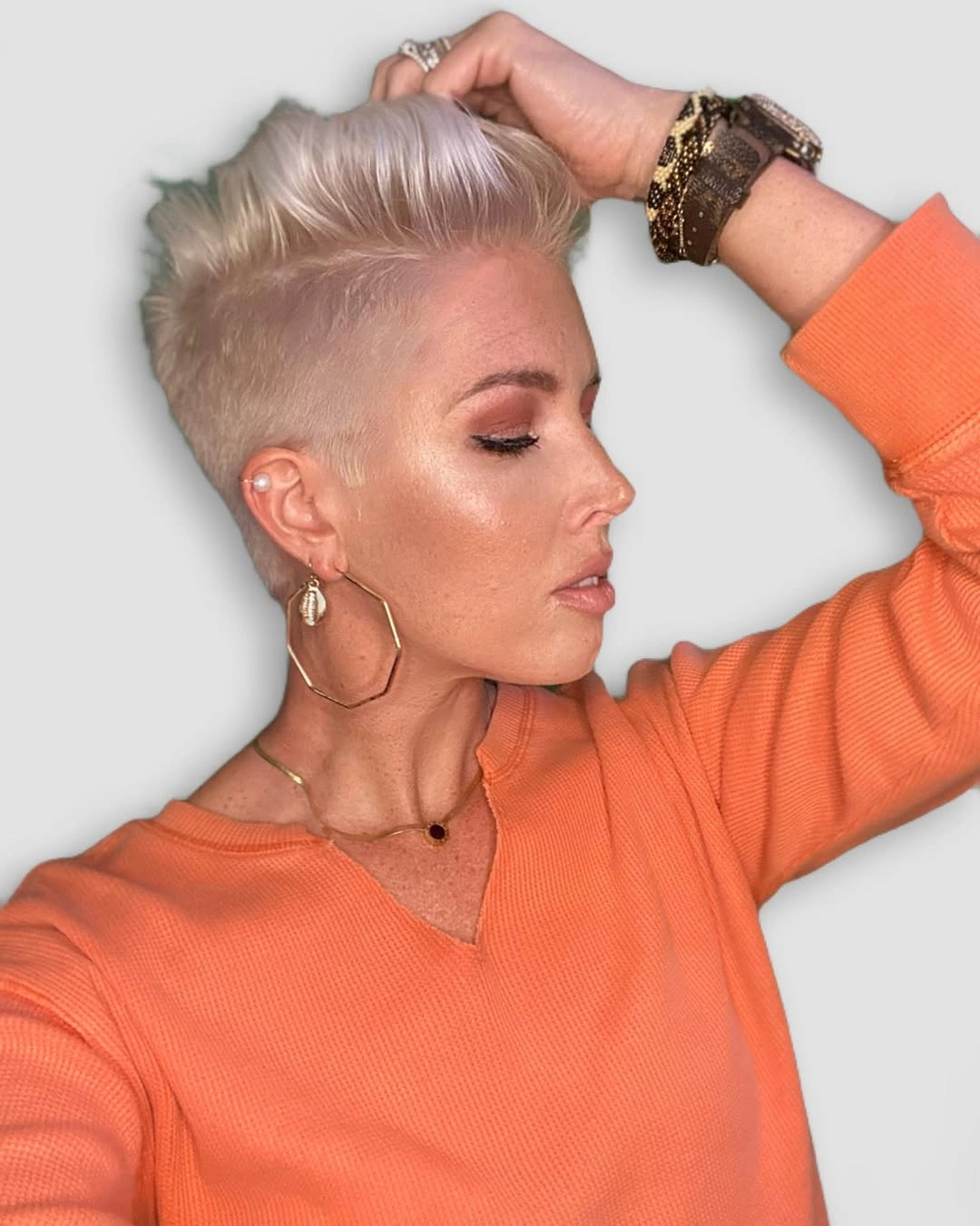 fall short haircuts 2026 Platinum Pompadour Pixie with Undercut
