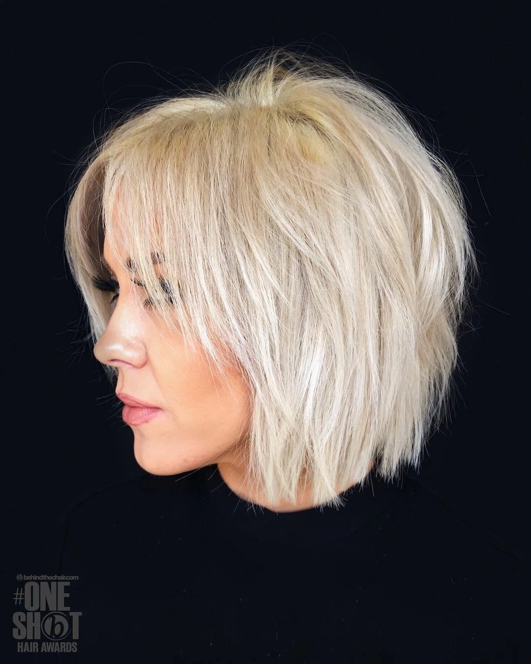 fall short haircuts 2026 Textured Platinum Bob with Feathered Layers