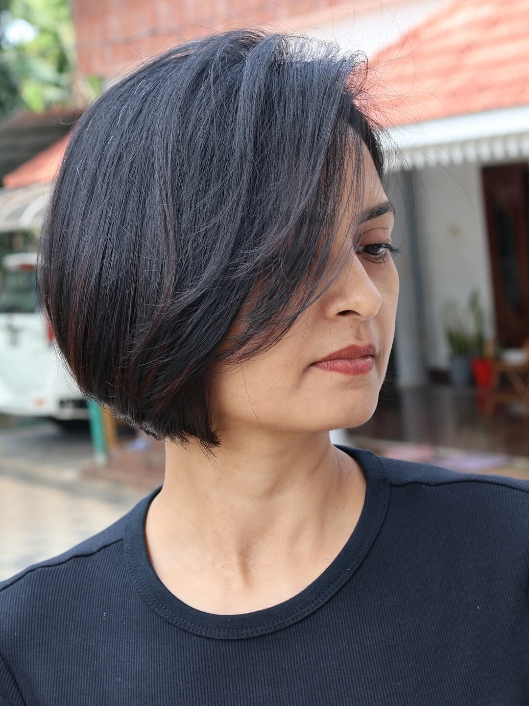 fall short haircuts 2026 Elegant Angled Bob with Deep Side Sweep