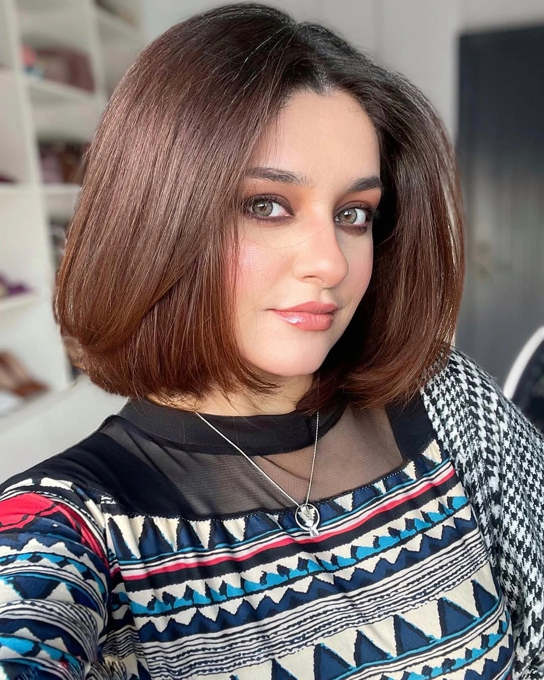 fall short haircuts 2026 Rounded Chocolate Bob with Soft Volume