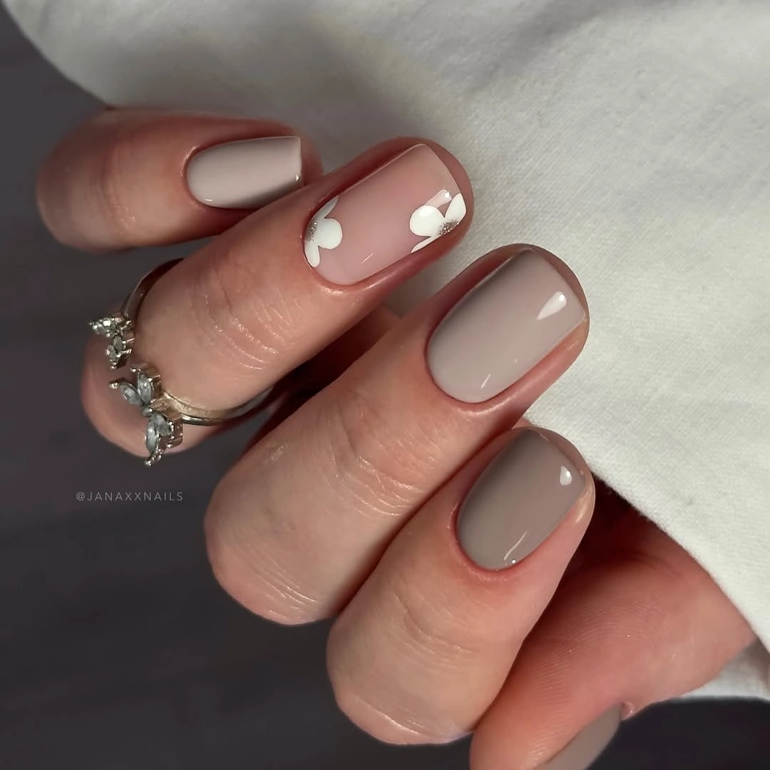 Fall short nails 2026 Taupe Short Nails With White Petal Accents