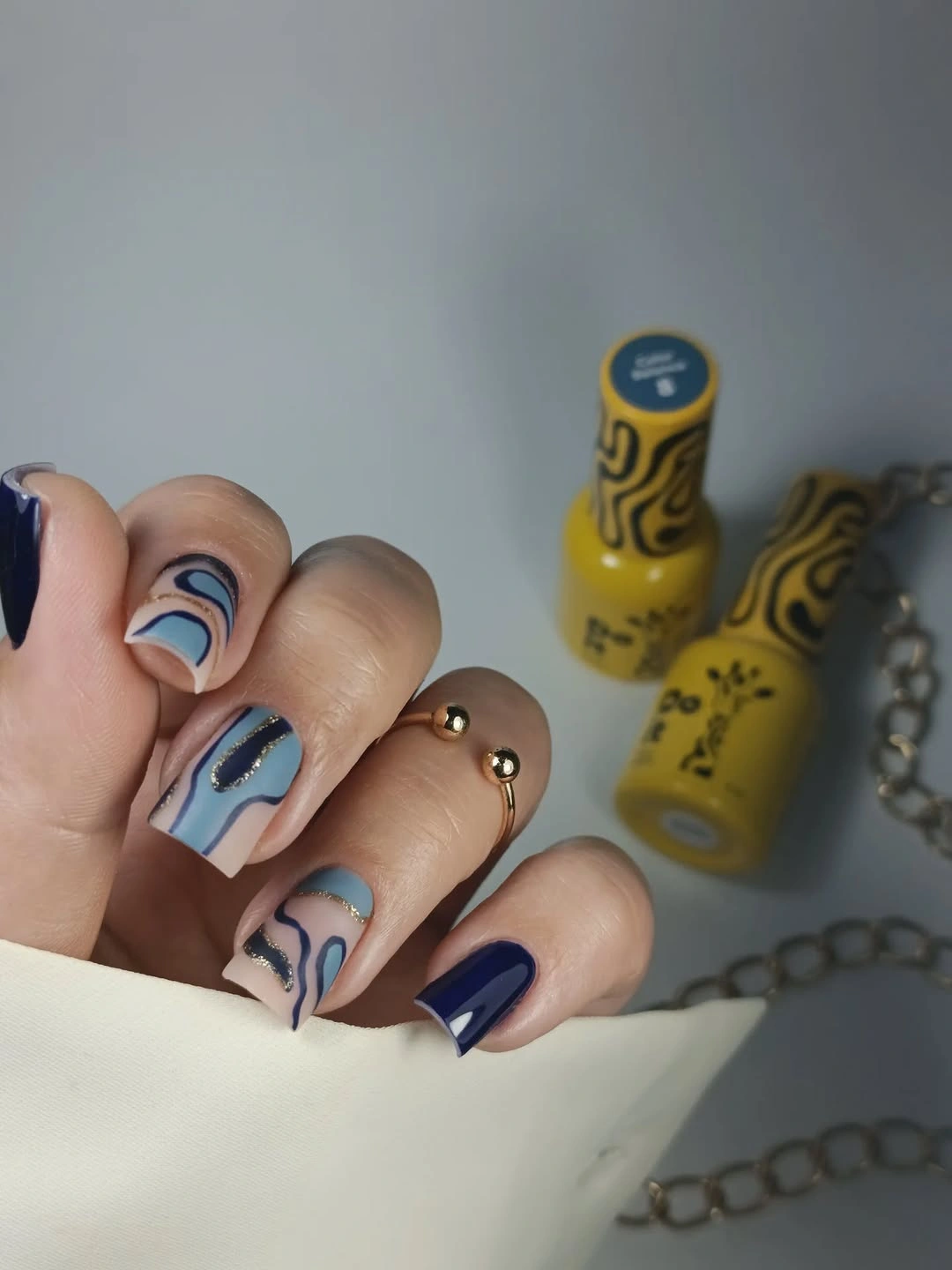 Fall short nails 2026 Blue Wave Nail Art on Short Nude Nails