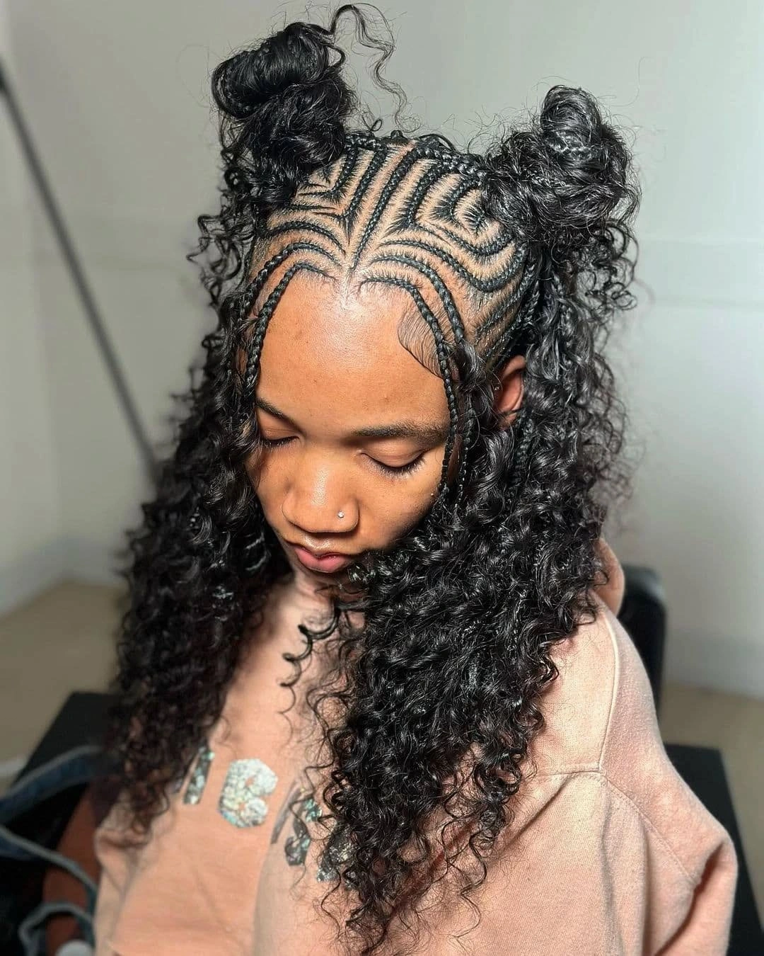 feed in braid hairstyles Playful Half-Up Feed-In Braids with Curly Space Buns