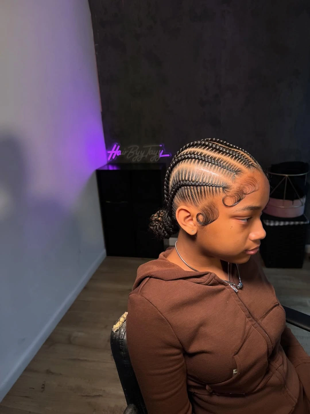 feed in braid hairstyles Low Braided Bun with Sleek Straight-Back Precision