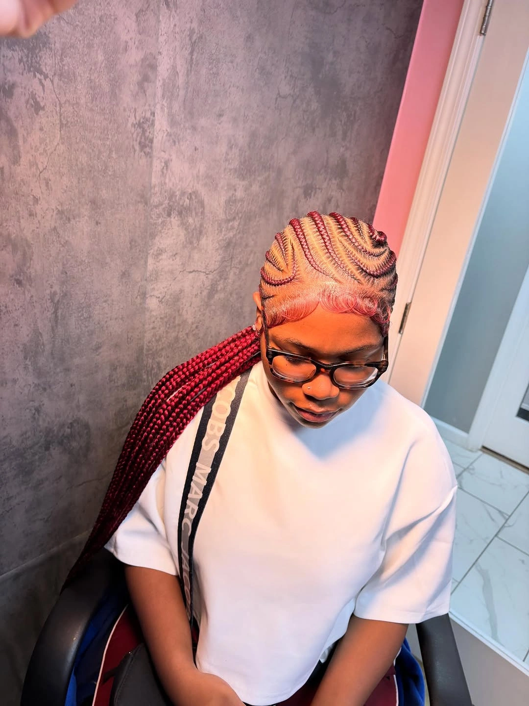 feed in braid hairstyles Rich Burgundy Feed-In Braids with Sleek Spiral Detailing