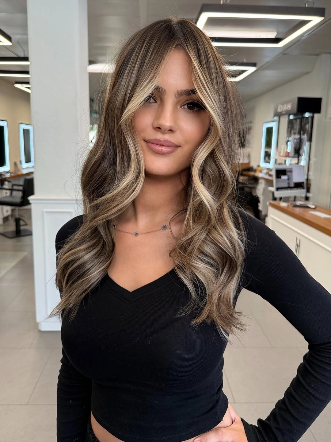 Hair Lowlights: Color Ideas and Inspiration Face-Framing Contrast That Modernizes Brunette Hair