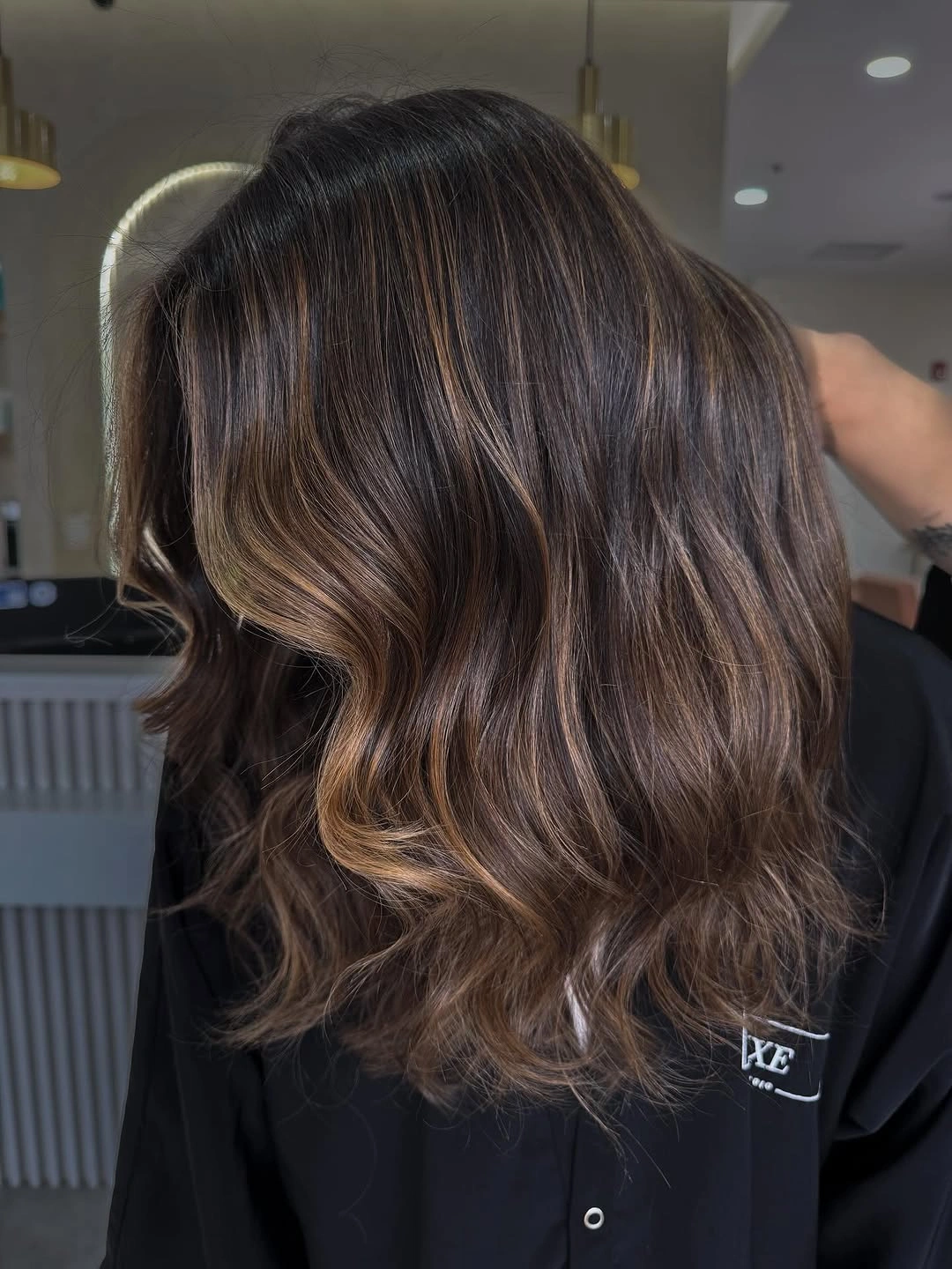 Hair Lowlights: Color Ideas and Inspiration Chocolate Waves with Soft Caramel Definition