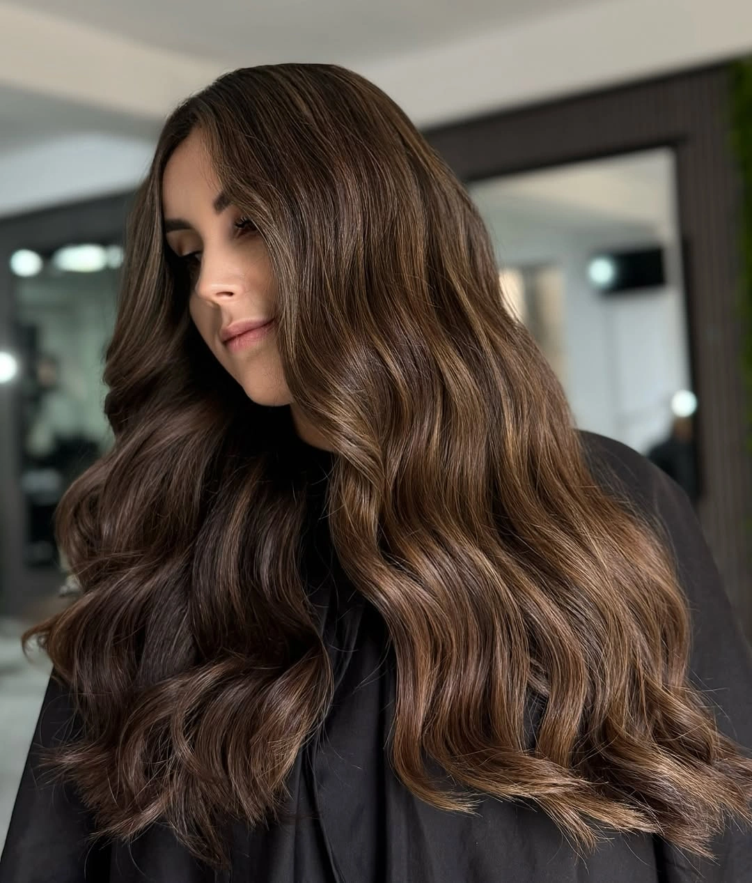 Hair Lowlights: Color Ideas and Inspiration Rich Cocoa Waves with Melted Honey Dimension