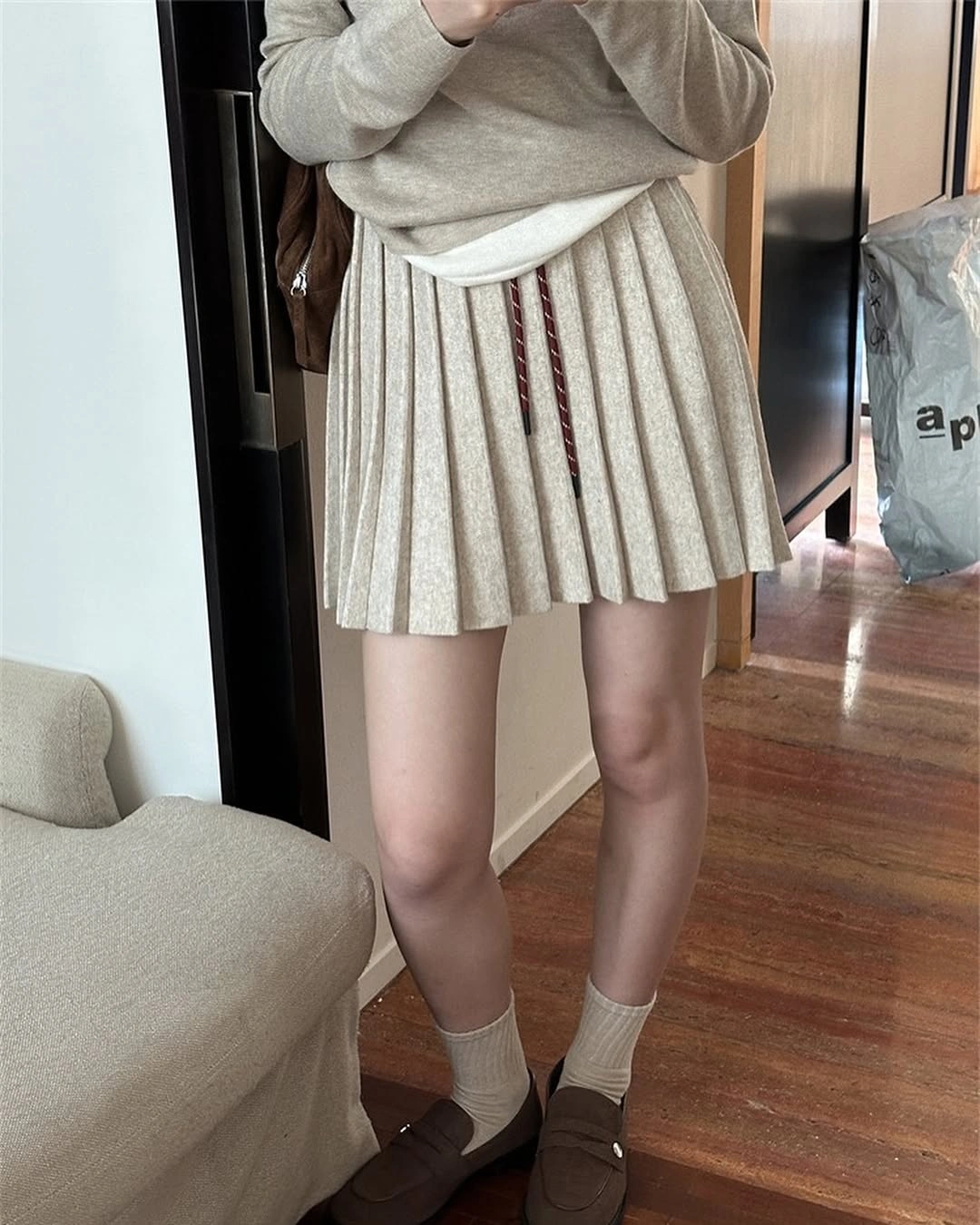 knit skirt outfits fall 2026 Pleated Knit Mini Skirts Bring Preppy Style Into Fall