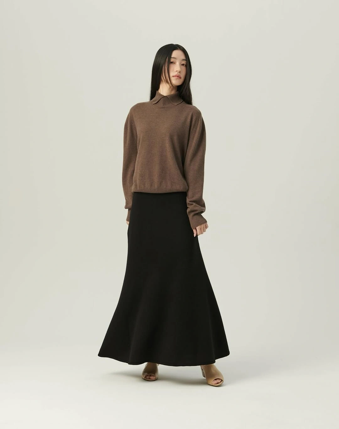 knit skirt outfits fall 2026 Minimalist Contrast With a Flowing Black Knit Skirt