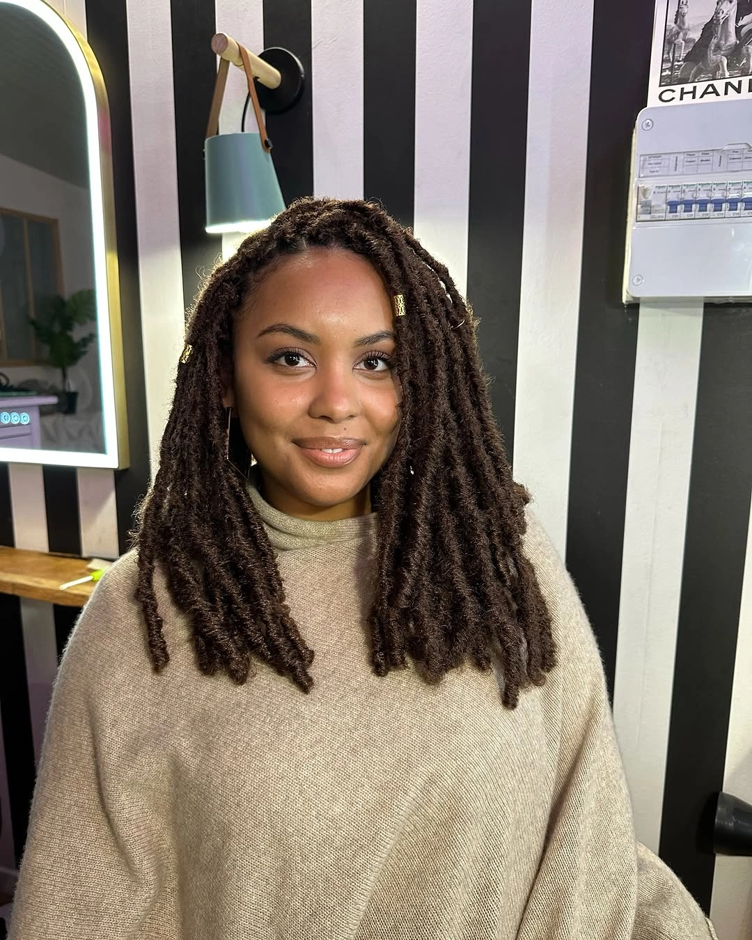 locs hairstyles for black women Chocolate Brown Shoulder-Length Locs With Gold Accents