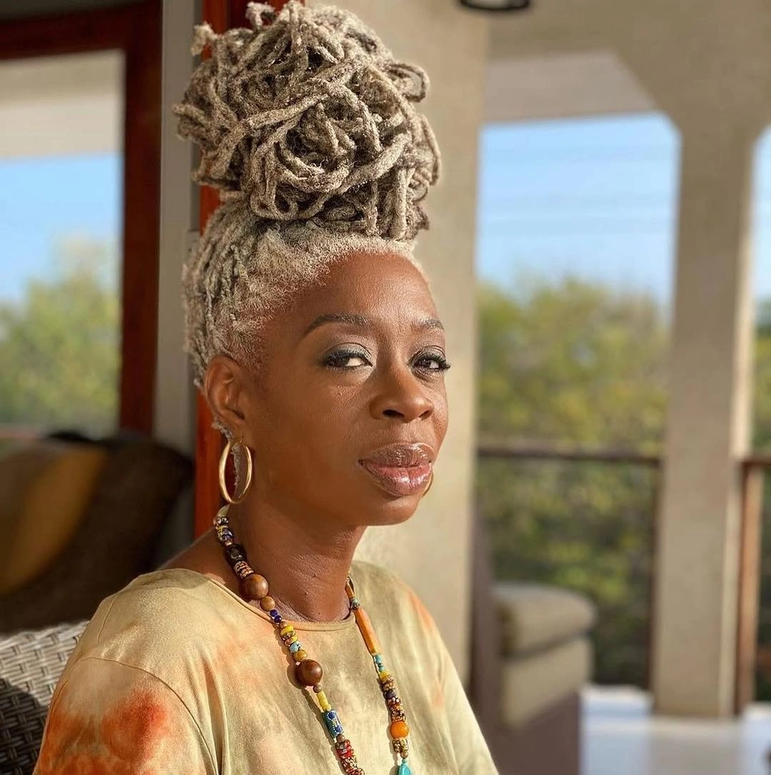 locs hairstyles for black women Elegant Silver High Bun With Statement Locs