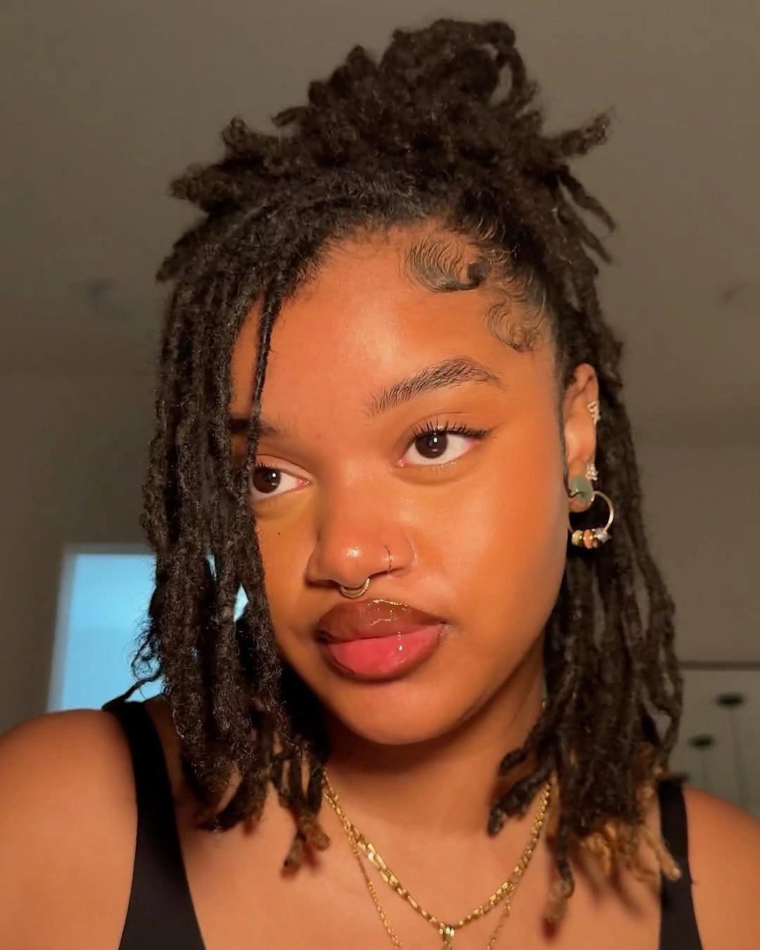locs hairstyles for black women Half-Up Short Locs With Soft Face-Framing Texture