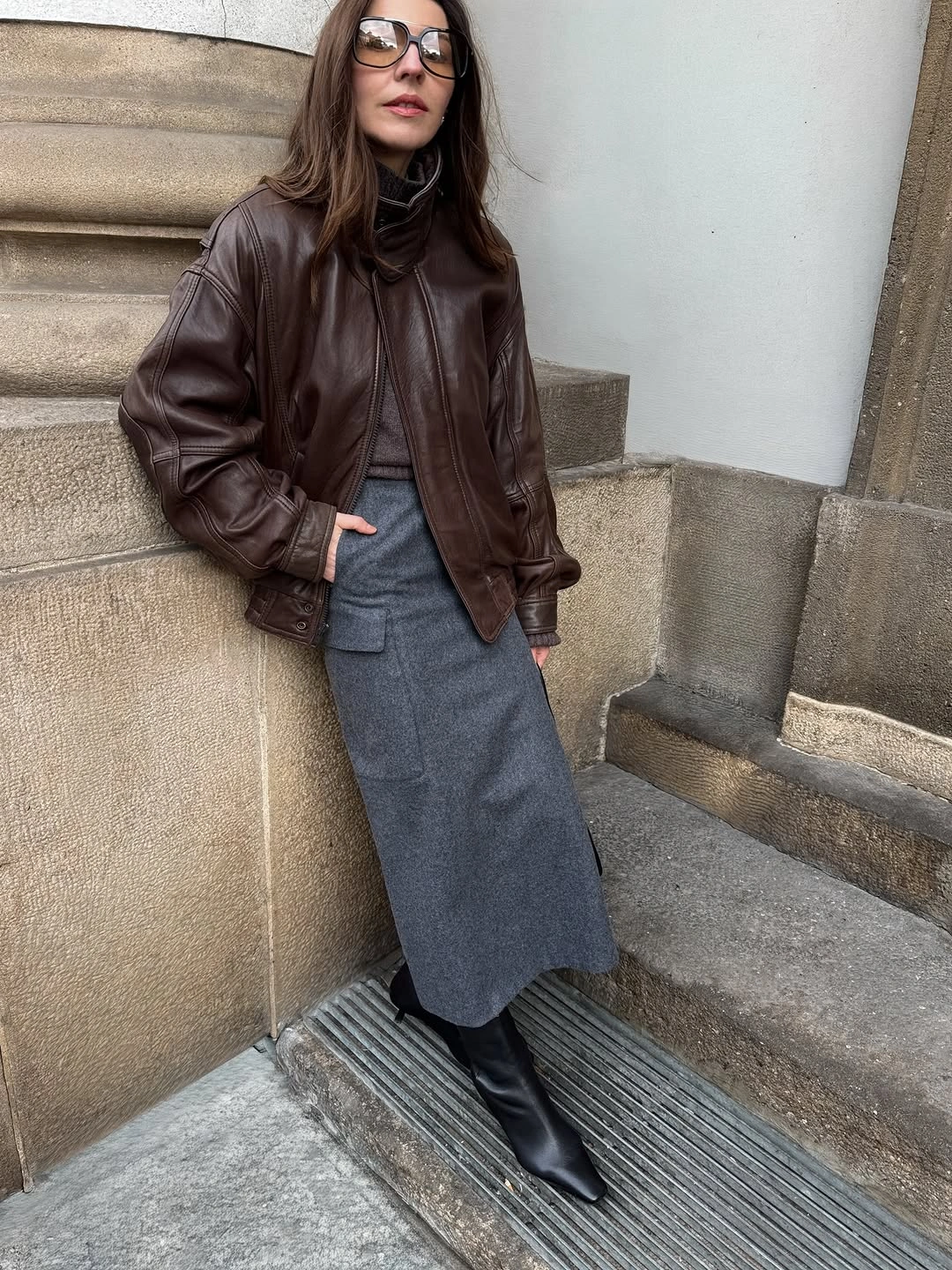 midi skirt fall outfit 2026 Grey Midi Skirt With Brown Leather Jacket Energy