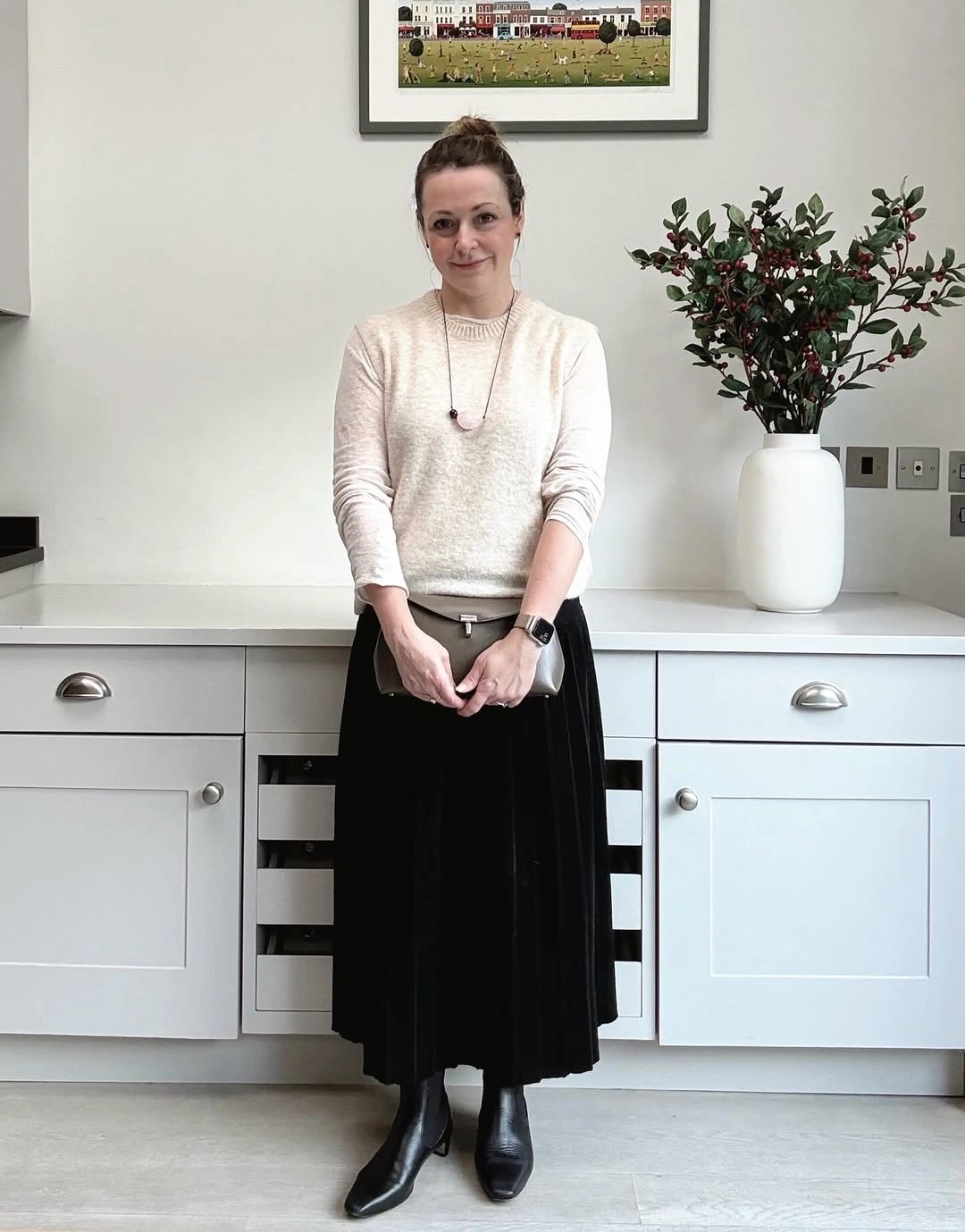 midi skirt fall outfit 2026 Black Pleated Midi Skirt With Soft Everyday Elegance