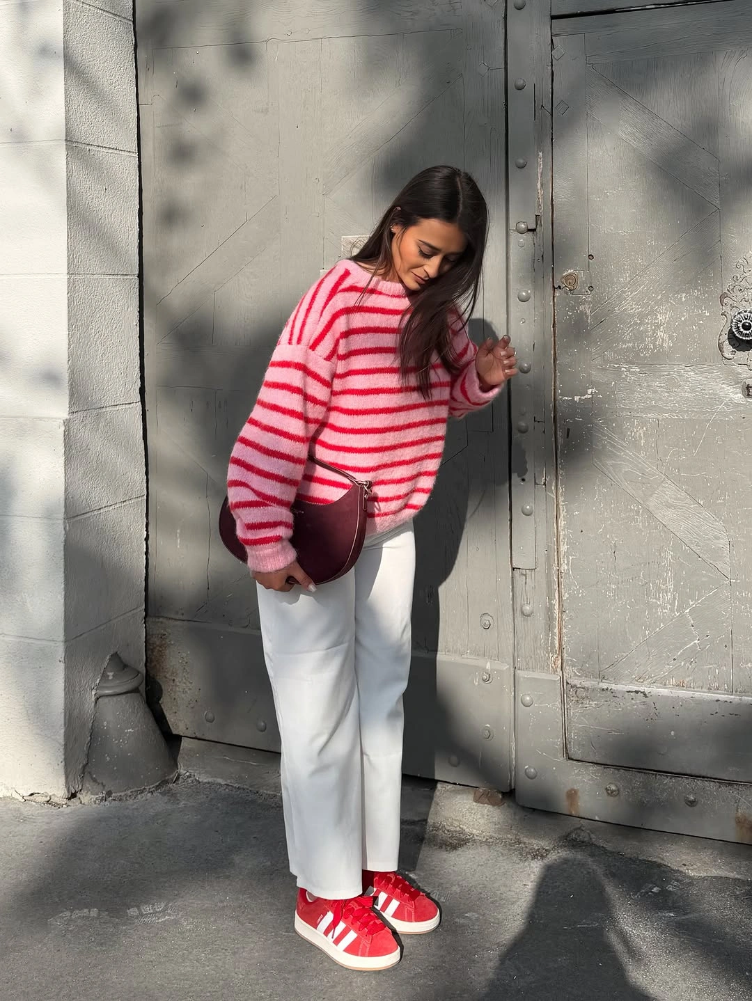 September fashion trends 2026 Red Striped Sweater With White Pants