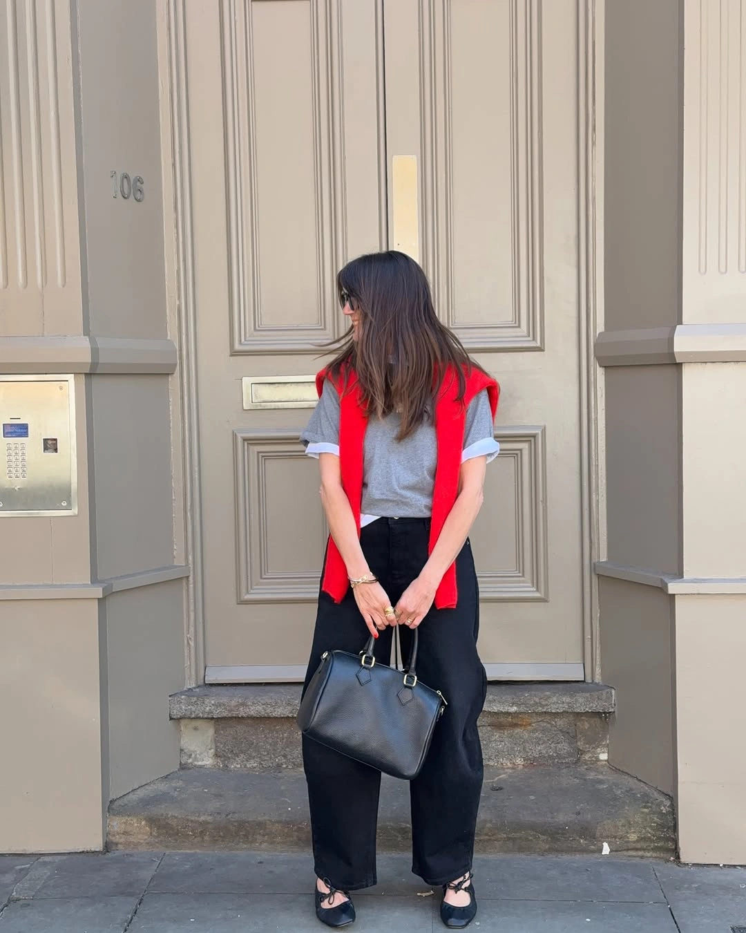 September fashion trends 2026 Red Tee With Black Vest And Dark Trousers