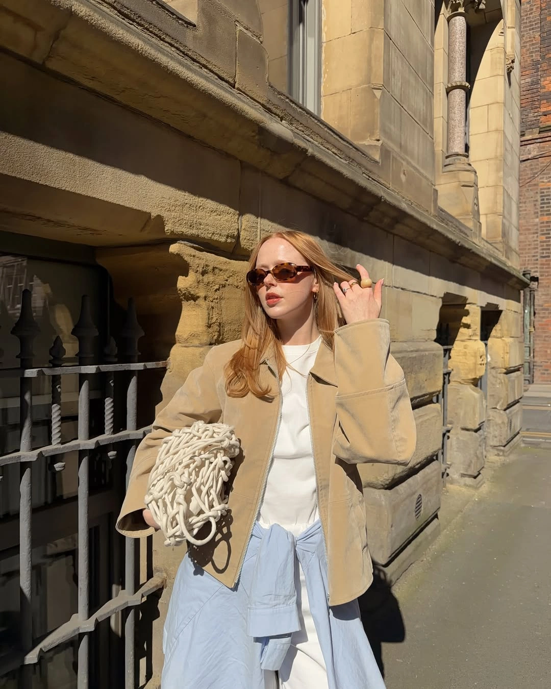 September fashion trends 2026 Tan Blazer With Pale Layers And Rope Bag