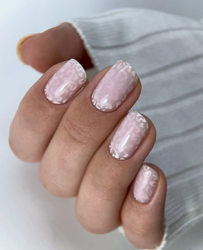 September nail art ideas 2026 Pink And White Squares With Raised Marble Texture