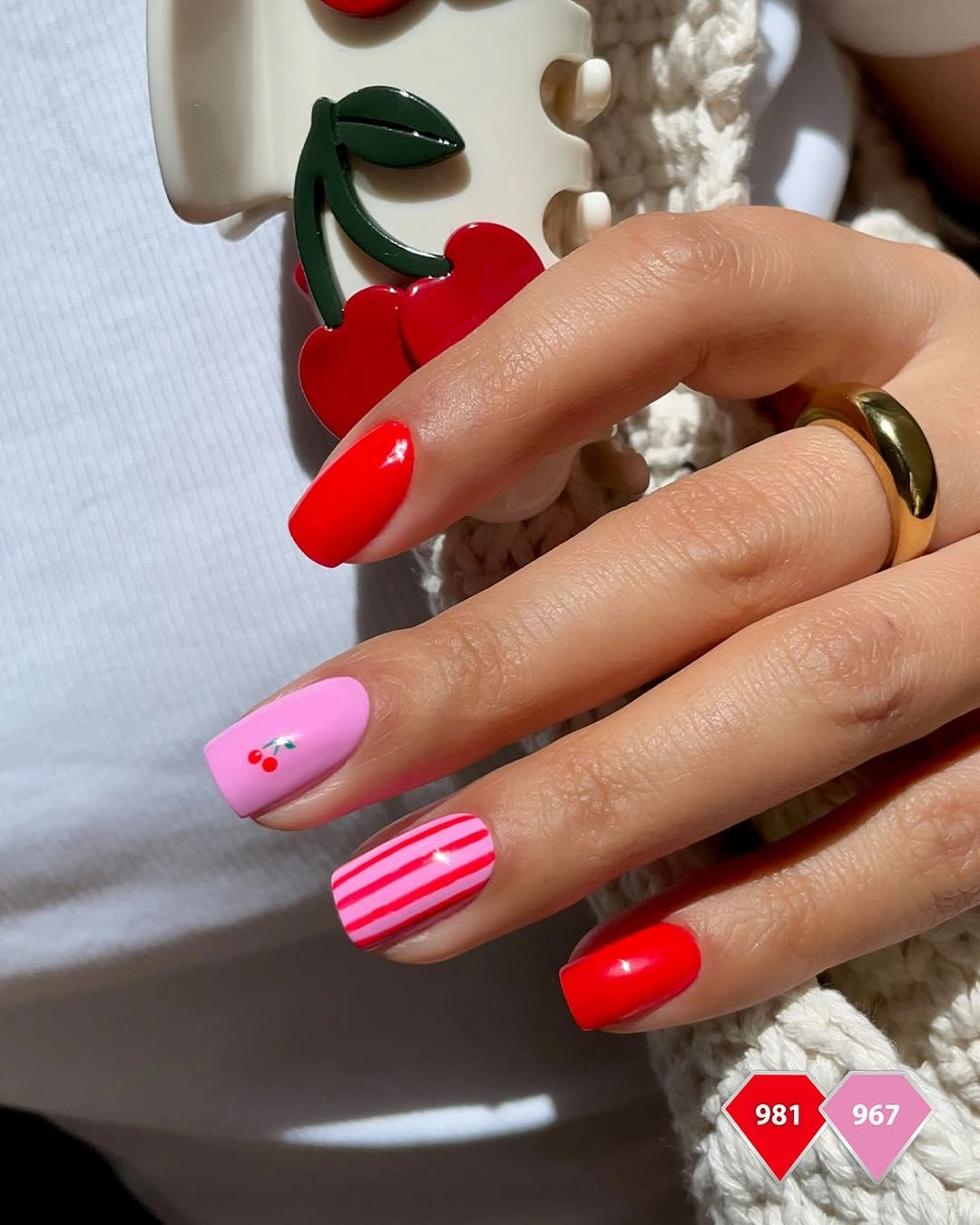September nail art ideas 2026 Cherry Red Nails With Stripes And Tiny Fruit Details