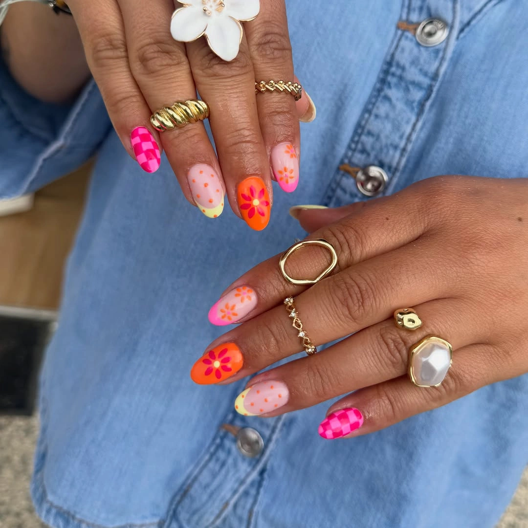 September nail designs 2026 Neon Pink And Orange Nails With Tiny Floral Details