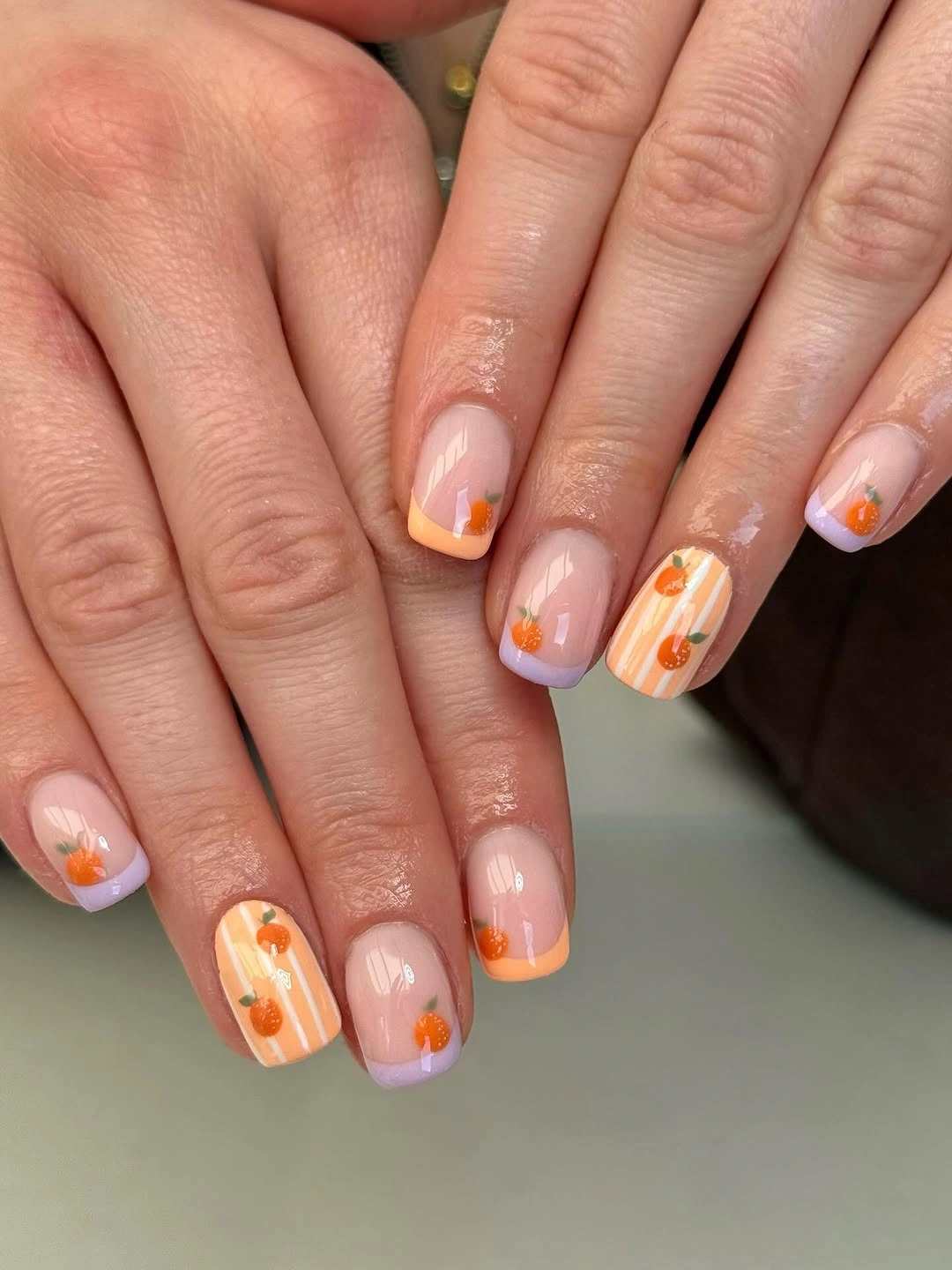 September nail designs 2026 Short Nude Nails With Small Orange Flowers